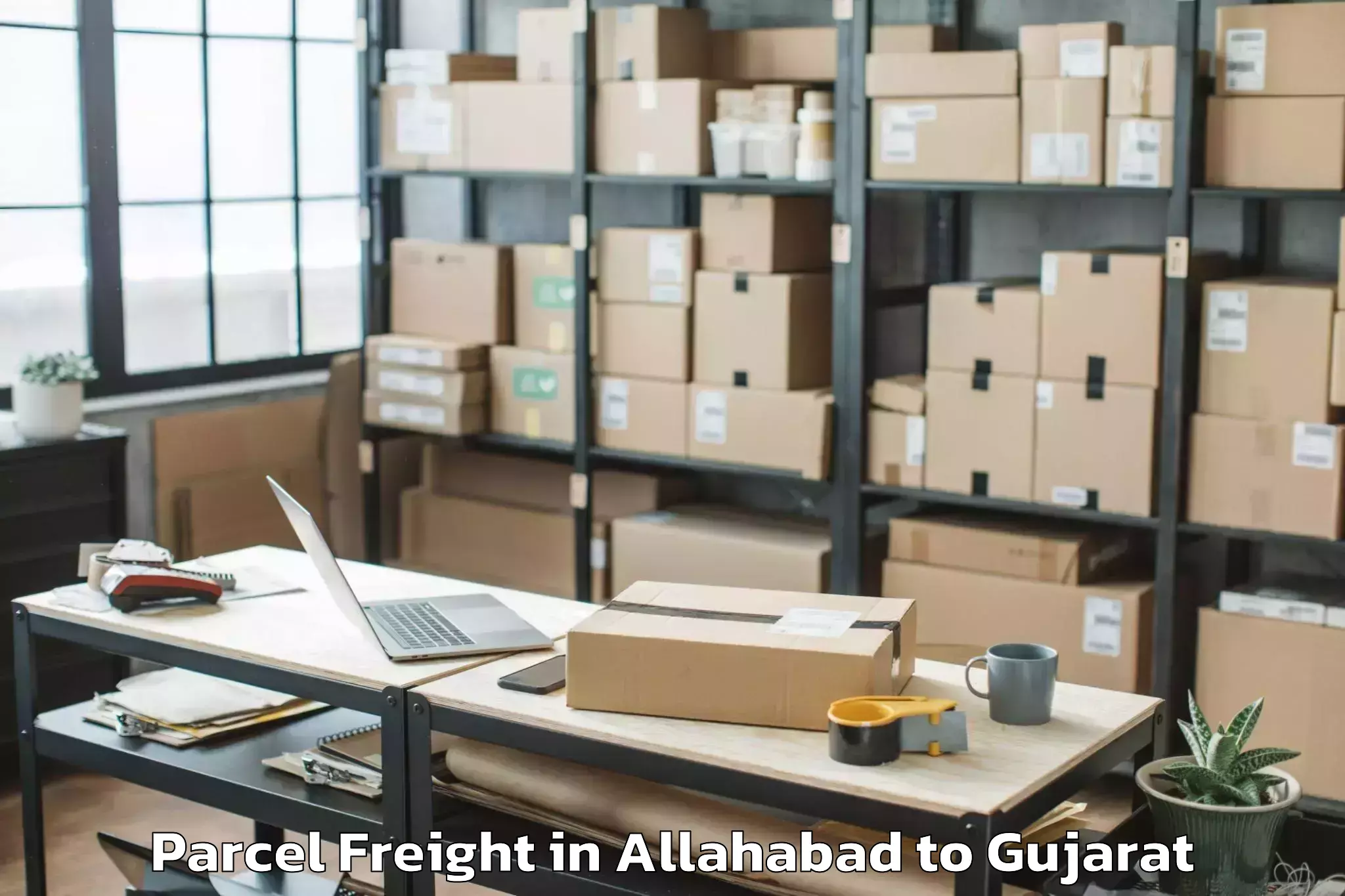 Allahabad to Kamdhenu University Gandhinaga Parcel Freight Booking